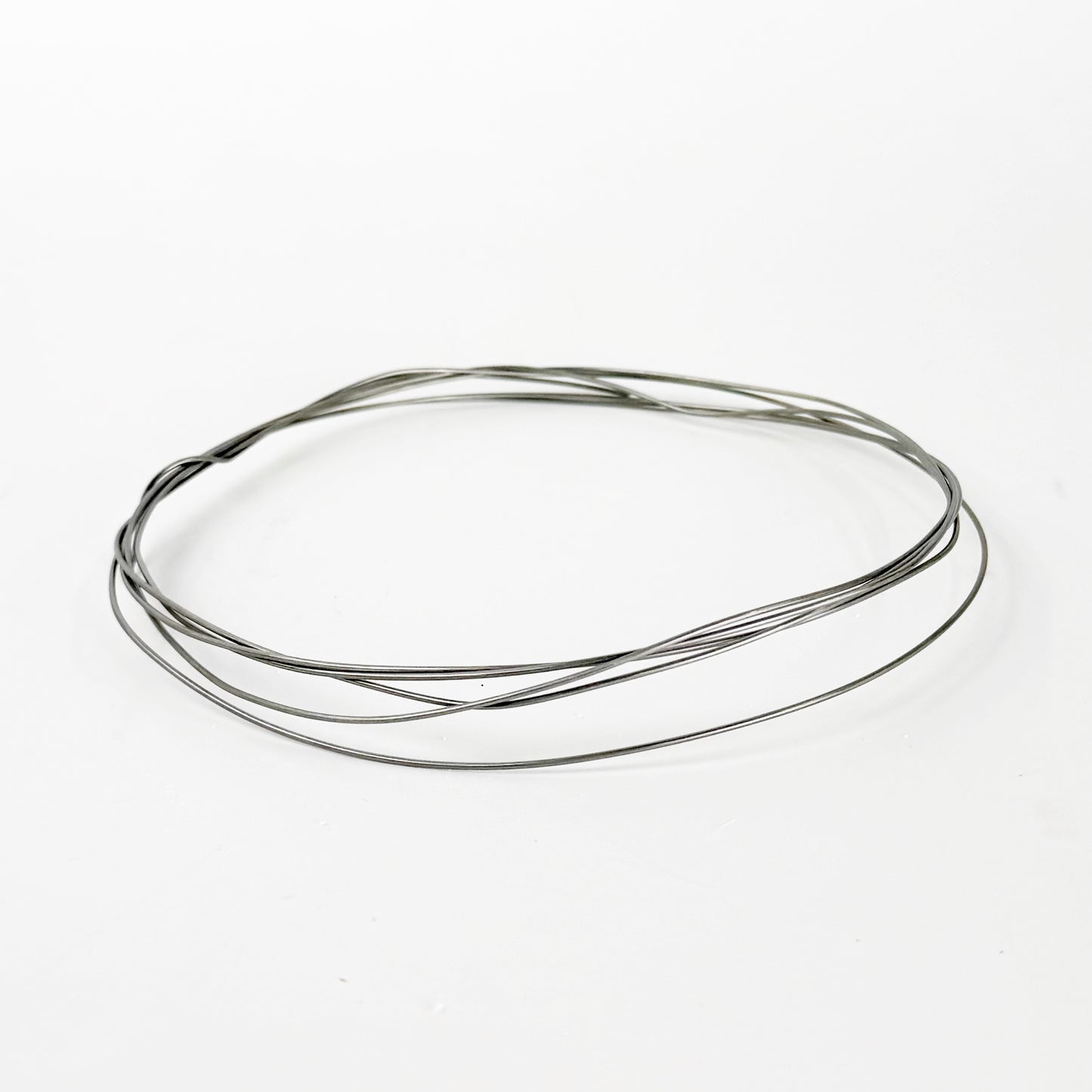 Kanthal wire is a high-resistance iron-chromium-aluminum (FeCrAl) alloy used as a heating element in kilns; scientifically, it works by resistive (Joule) heating, where electrical energy passing through the wire is converted into heat due to its high electrical resistance, while the aluminum in the alloy forms a protective alumina (Al₂O₃) oxide layer on the surface that prevents further oxidation and allows it to maintain strength at temperatures up to ~1400 °C (2550 °F).