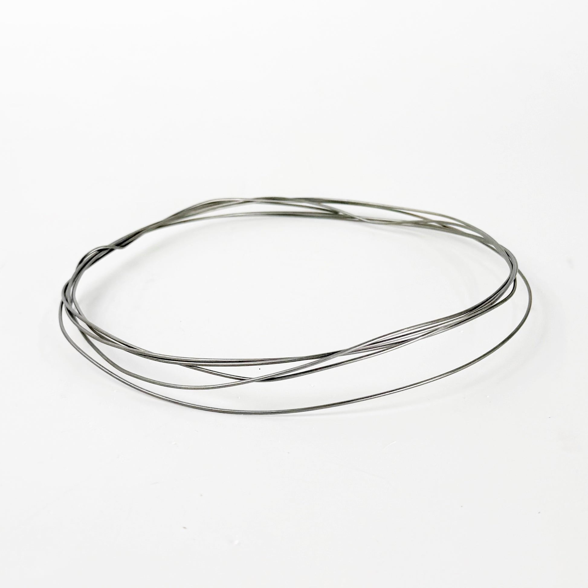 Kanthal wire is a high-resistance iron-chromium-aluminum (FeCrAl) alloy used as a heating element in kilns; scientifically, it works by resistive (Joule) heating, where electrical energy passing through the wire is converted into heat due to its high electrical resistance, while the aluminum in the alloy forms a protective alumina (Al₂O₃) oxide layer on the surface that prevents further oxidation and allows it to maintain strength at temperatures up to ~1400 °C (2550 °F).