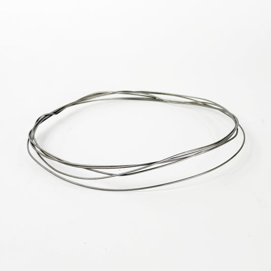Kanthal wire is a high-resistance iron-chromium-aluminum (FeCrAl) alloy used as a heating element in kilns; scientifically, it works by resistive (Joule) heating, where electrical energy passing through the wire is converted into heat due to its high electrical resistance, while the aluminum in the alloy forms a protective alumina (Al₂O₃) oxide layer on the surface that prevents further oxidation and allows it to maintain strength at temperatures up to ~1400 °C (2550 °F).