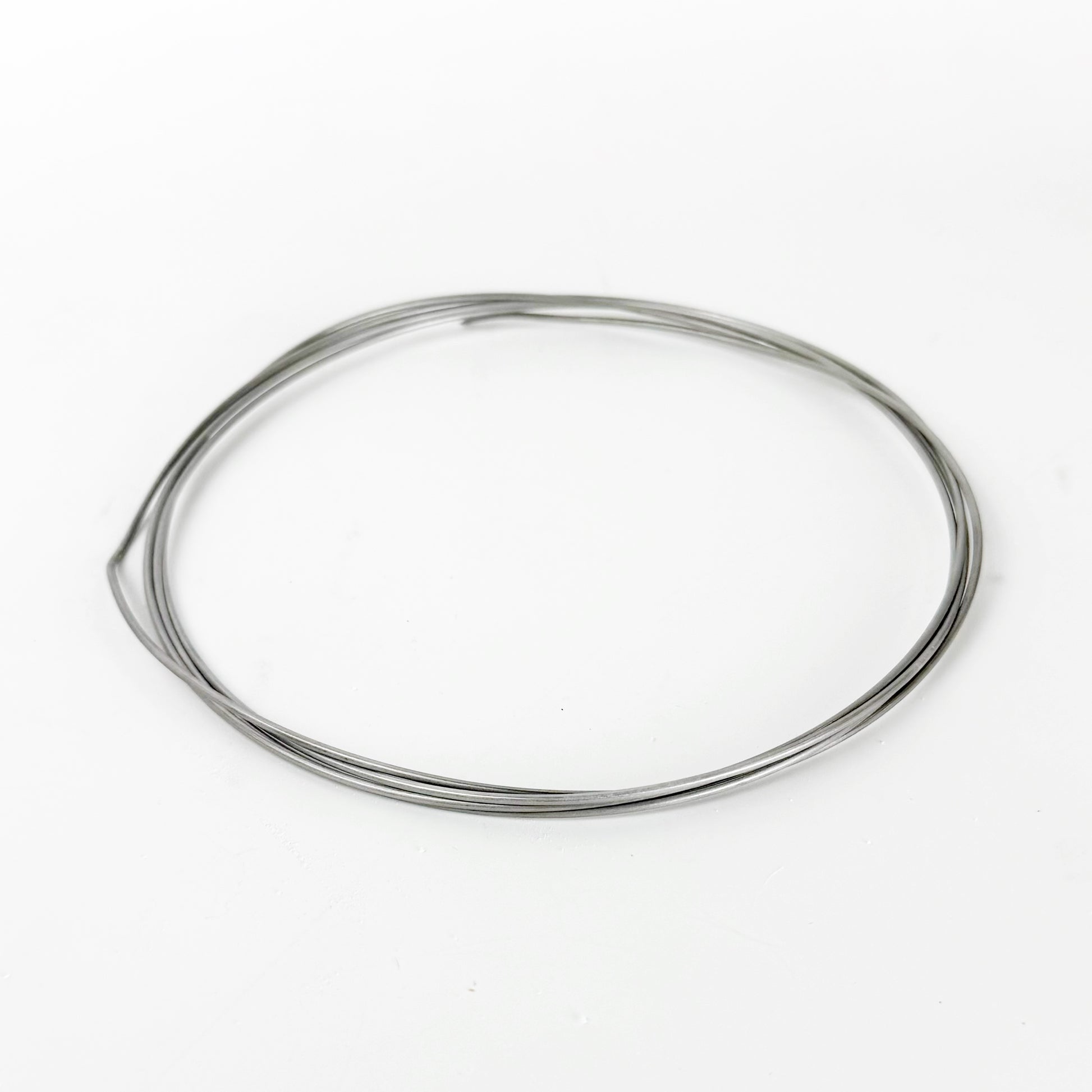 Kanthal wire is a high-resistance iron-chromium-aluminum (FeCrAl) alloy used as a heating element in kilns; scientifically, it works by resistive (Joule) heating, where electrical energy passing through the wire is converted into heat due to its high electrical resistance, while the aluminum in the alloy forms a protective alumina (Al₂O₃) oxide layer on the surface that prevents further oxidation and allows it to maintain strength at temperatures up to ~1400 °C (2550 °F).