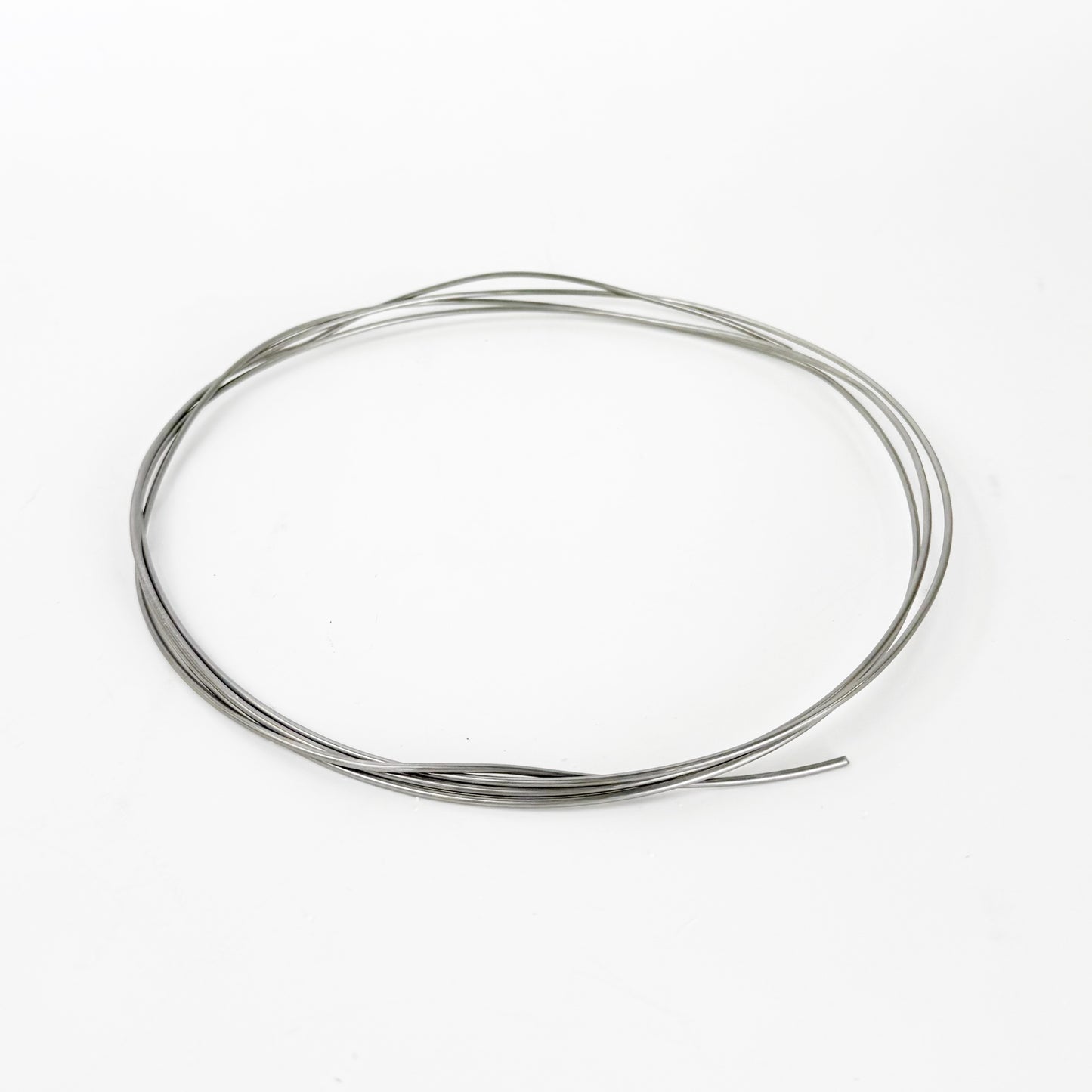 Kanthal wire is a high-resistance iron-chromium-aluminum (FeCrAl) alloy used as a heating element in kilns; scientifically, it works by resistive (Joule) heating, where electrical energy passing through the wire is converted into heat due to its high electrical resistance, while the aluminum in the alloy forms a protective alumina (Al₂O₃) oxide layer on the surface that prevents further oxidation and allows it to maintain strength at temperatures up to ~1400 °C (2550 °F).